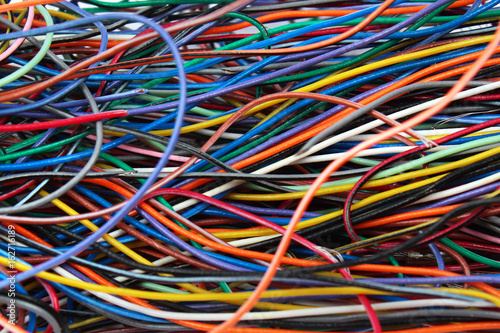 Colorful mess of cables wires and connectors