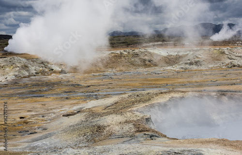 Steam Pits of Geothermal Landscape Hverarond on Iceland