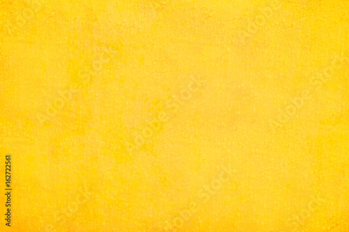Texture and background of yellow concrete wall..