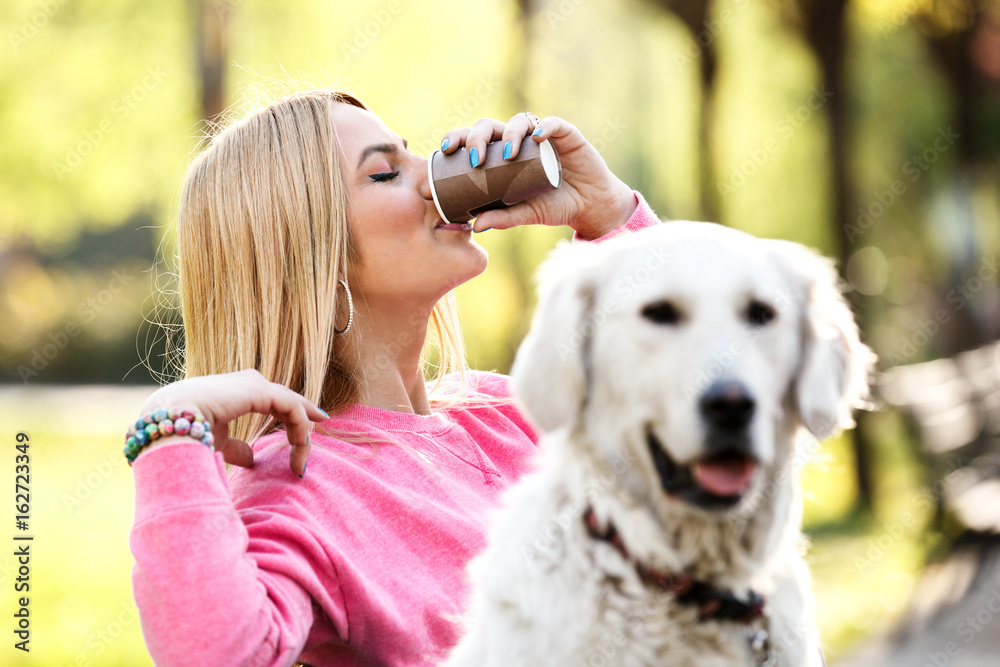 Woman enjoying park with dog Woman enjoying park with dog
