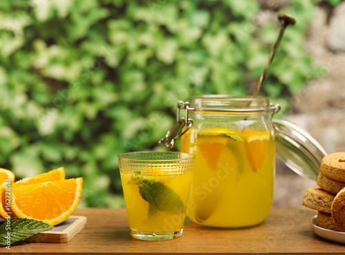Fresh orangeade with cookies