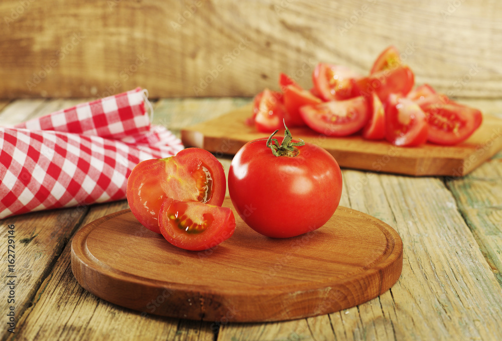 Tomatoes on cutting board