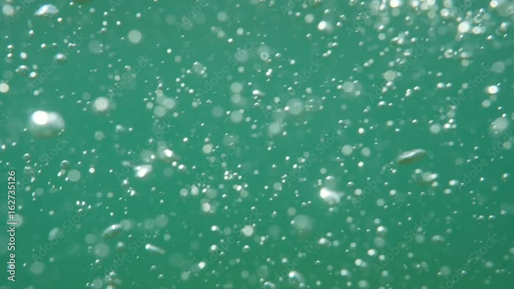 Bubbles rising to the surface. Air bubbles in water in sea (underwater shot), good for backgrounds. Slow motion.
Bubbles rising to the surface. Air bubbles in water in sea (underwater shot), good for backgrounds. Slow motion.