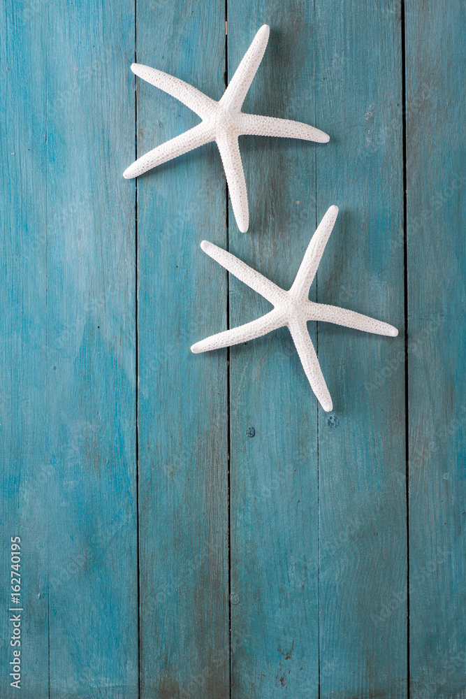 Summer background with starfish on blue background ,holiday card Summer background with starfish on blue background ,holiday card