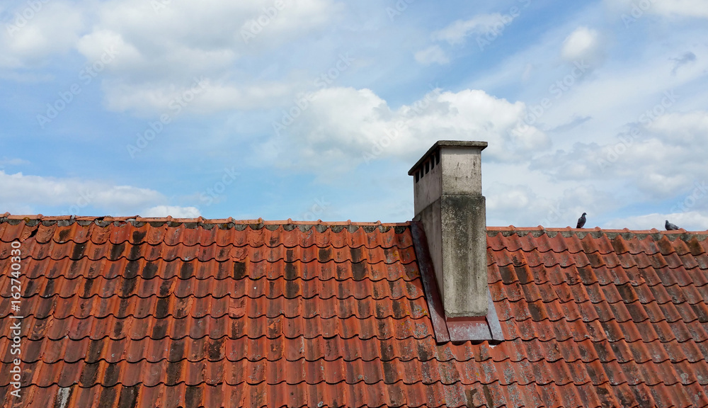 Roof tiles and blue sky