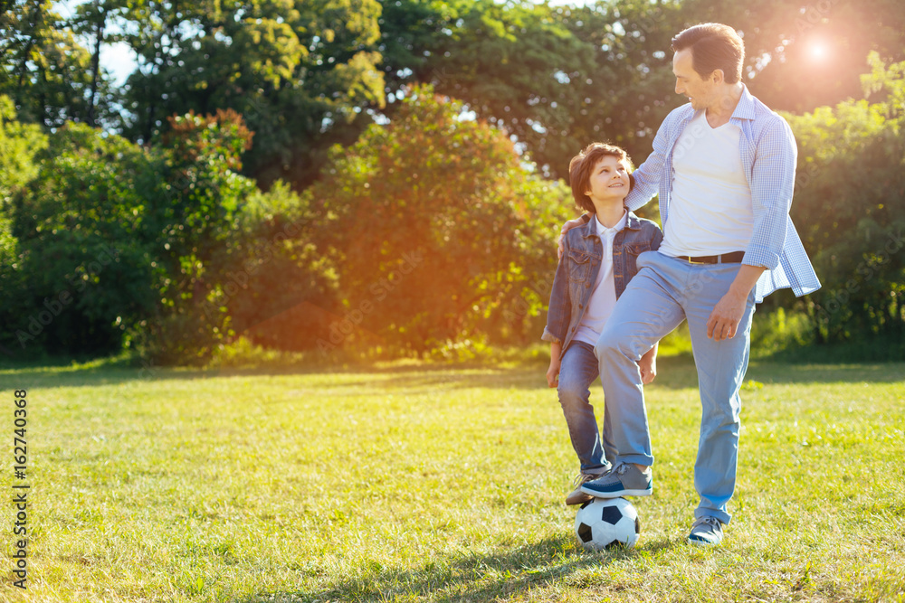 Easy going loving parent spending time with his kid Easy going loving parent spending time with his kid