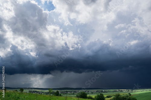 Approaching summer storm in the field