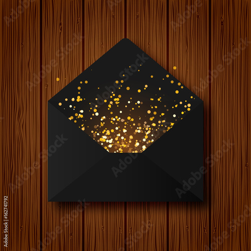 Black paper vector envelope letter with golden shining sparkling glitter on wood texture background
