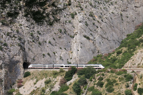 Train crossing a tunnel in Caminito del Rey, Malaga, Spain
