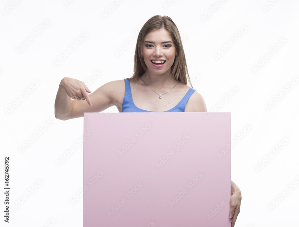Young happy woman portrait of a confident businesswoman showing presentation, pointing placard pink background. Ideal for banners, registration forms, presentation, landings, presenting concept. Young happy woman portrait of a confident businesswoman showing presentation, pointing placard pink background. Ideal for banners, registration forms, presentation, landings, presenting concept.