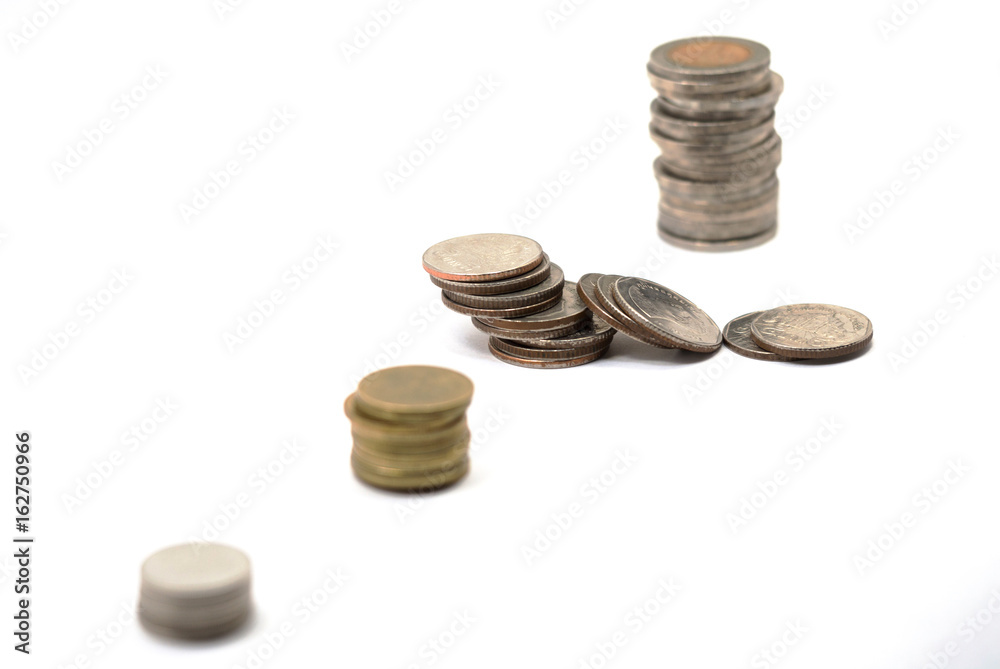 Four stack coins show the money saving concept, financial concept, business growth concept, Investment concept. Four stack coins show the money saving concept, financial concept, business growth concept, Investment concept.
