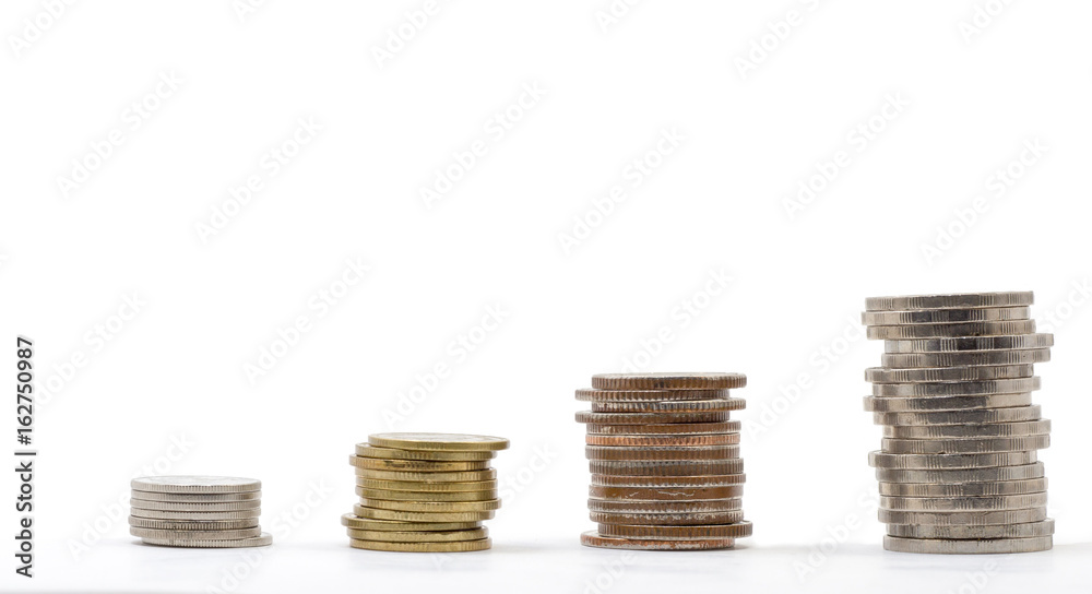 Four stack coins show the money saving concept, financial concept, business growth concept, Investment concept. Four stack coins show the money saving concept, financial concept, business growth concept, Investment concept.