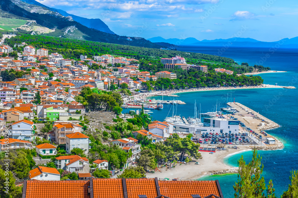 Fototapeta premium Basra Voda Croatia. / Aerial view on Adriatic Sea and Baska Voda place in Makarska Riviera, Dalmatia region, popular tourist summer resort in Croatia, Mediterranean.