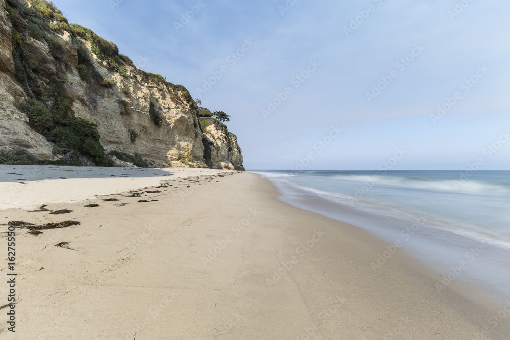 Dume Cove beach with motion blur water in Malibu, California. Dume Cove beach with motion blur water in Malibu, California.