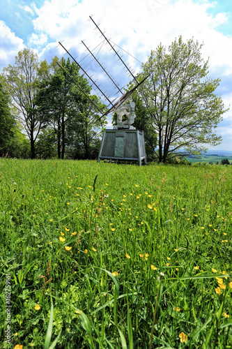 Special antenna radiotelescope behind the meadow photo