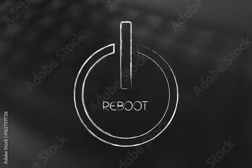 reboot symbol on laptop bokeh background photo