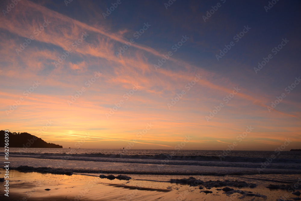 Sunset from Baker Beach in San Francisco California near Golden Gate Bridge, USA
