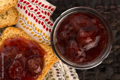 Breakfast of cherry jam on toast