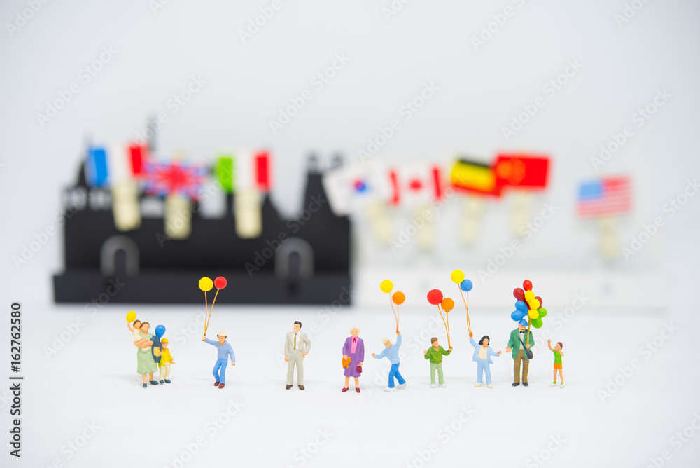 The concept of international festival. Family are celebrating in front of city with international flag