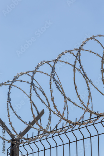 barbed wire on sky background