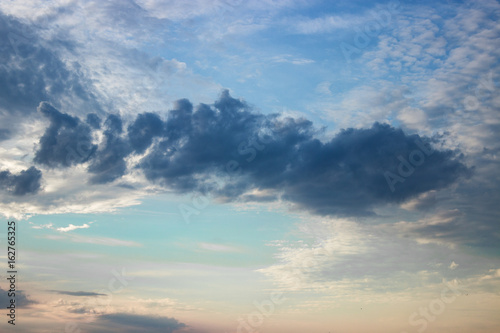 Fiery orange sunset sky. Sky in a beautiful sunrise light, natural background