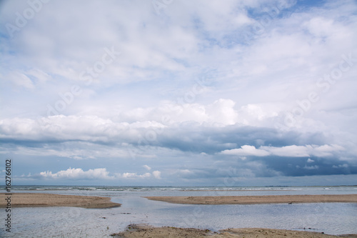 Fototapeta Naklejka Na Ścianę i Meble -  Seascape with beautiful storm clouds