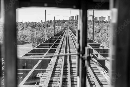 Streetcar travelling across a bridge