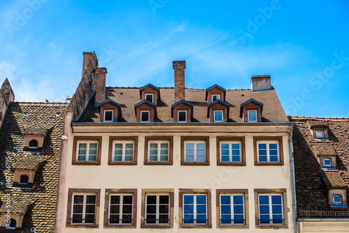 Detail of a building in the city centre of Strasbourg against blue sky