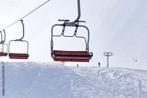 Ski lift in the mountains in winter