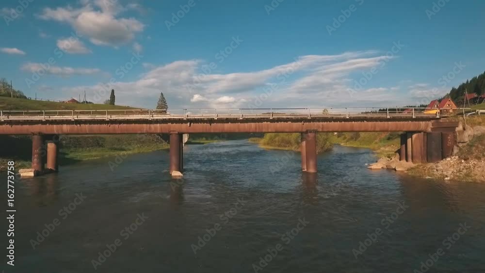 aerial view the bridge over the river,shooting from the air aerial view the bridge over the river,shooting from the air
