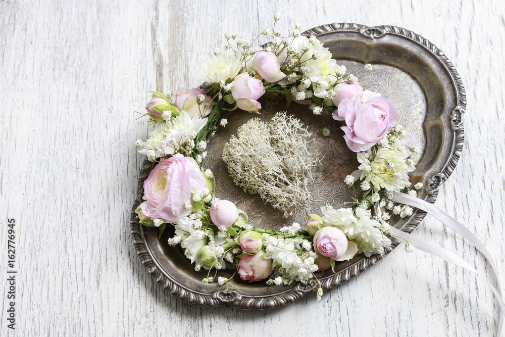 Wedding wreath with rose, ranunculus and chrysanthemum flowers. Wedding wreath with rose, ranunculus and chrysanthemum flowers.