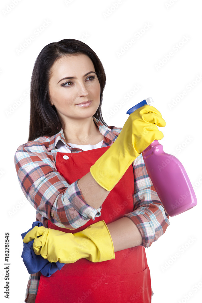 Woman in rubber gloves holding rag and bottle with a sprayer. Uses detergent for cleaning. Isolated on white background Woman in rubber gloves holding rag and bottle with a sprayer. Uses detergent for cleaning. Isolated on white background