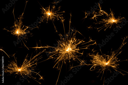 A sparkler is a type of hand-held firework that burns slowly while emitting colored flames, sparks, and other effects.