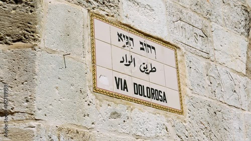 Via Dolorosa street sign in Jerusalem old city. Via Dolorosa is a sacred place for the all Christians in the world. Located in Holy land Jerusalem. Zoom shot.