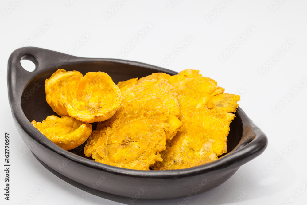 Plantain cups and patacones on white background Plantain cups and patacones on white background