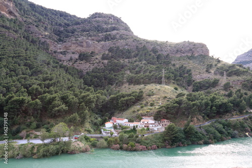 Landscape with the river Guadalhorce passing at the foot of the mountain, in the province of Malaga, Spain