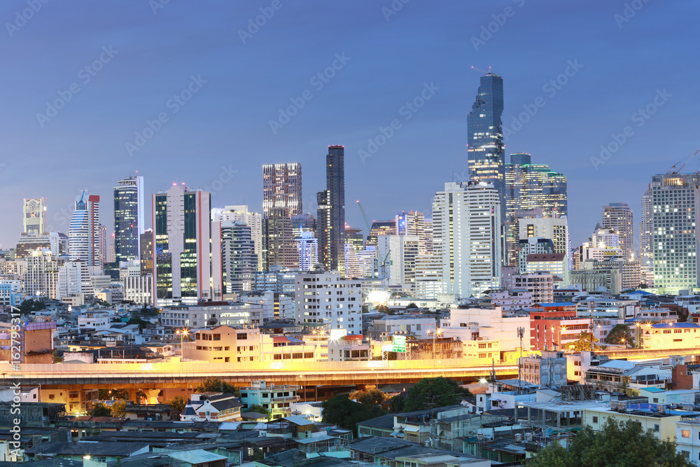 View of Bangkok at twilight time in cityscape.