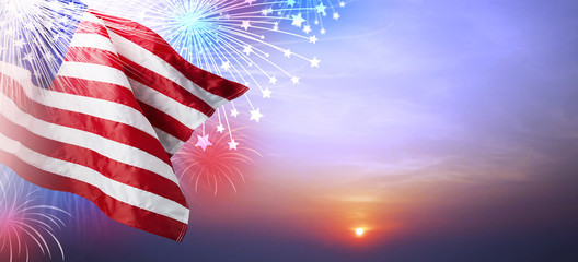 USA flag with firework at sunset background