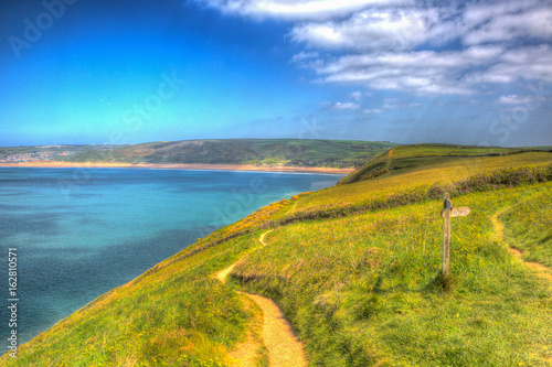 Coast path to Woolacombe Devon England UK in summer with blue sky hdr
