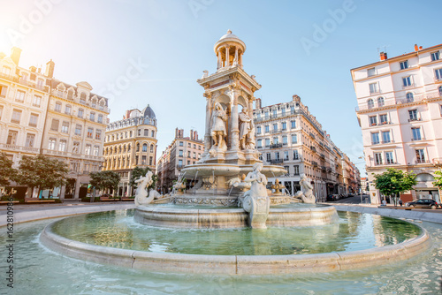 Morning view on Jacobins square and beautiful fountain in Lyon city, France photo