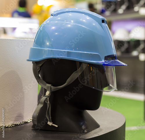 mannequins with Safety helmets and safety glass on a shelf ; Working Hard Hat;Personal Protection Equipment PPE photo