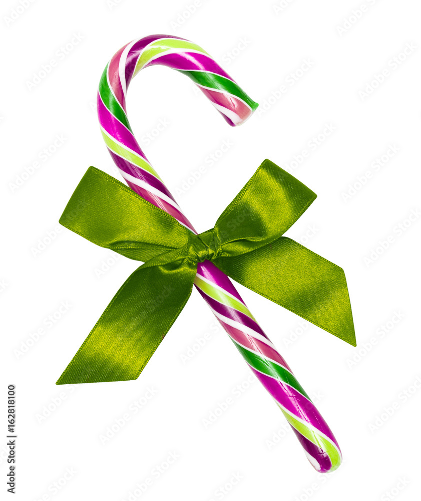Purple candy cane with green bow, isolated on white Purple candy cane with green bow, isolated on white