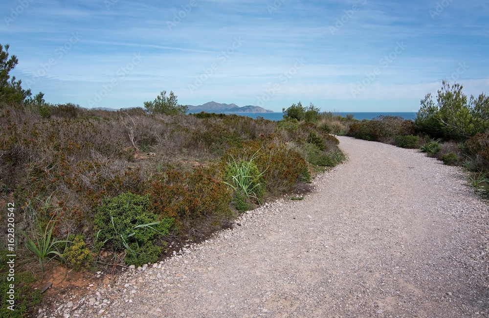 Gravel road towards the sea