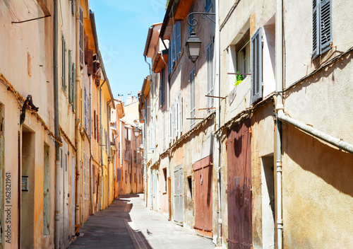 beautiful old town street of Aix en Provence, France, retro toned © neirfy