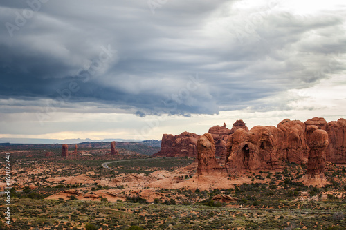 Sandstone Rocky Landscape in storm clouds of Arches National Park, Utah, USA