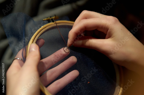 needlework hands on the Hoop
