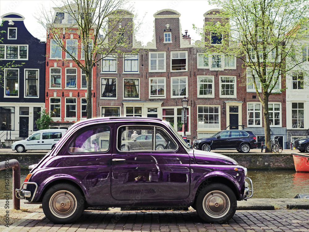 Travel to Amsterdam on a retro car.