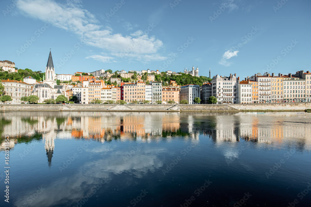 Morning view on the riverside with saint George cathedral in the old town of Lyon city