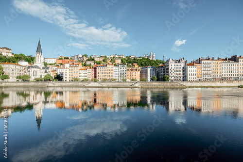 Morning view on the riverside with saint George cathedral in the old town of Lyon city