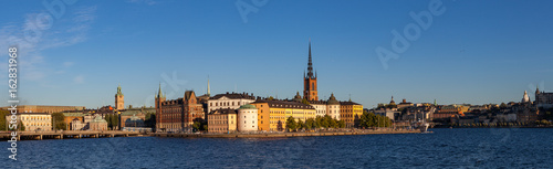 STOCKHOLM, SWEDEN - SEPTEMBER 19, 2016: Scenic summer sunset panorama of the Old Town (Gamla Stan) architecture
